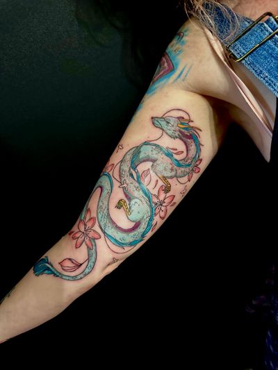 Unleash the magic with this stunning Studioghibli-inspired dragon tattoo by Oliver Soames. Perfect for anime lovers!