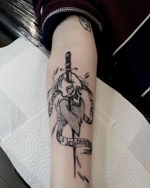 Illustrative traditional tattoo featuring a heart, skull, and sword with a French twist by Ludo Matmut.