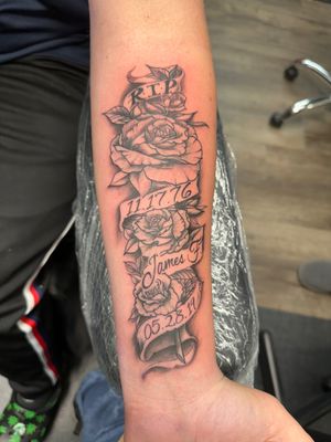 Beautiful illustrative tattoo design featuring a rose, memento mori theme, and banner by Ronny East.