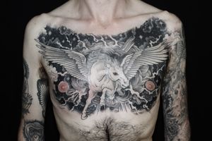 Fly high with this stunning illustrative pegasus tattoo designed by the talented artist Stewart Robson.