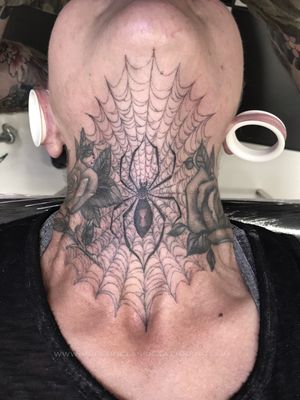 Stewart Robson brings the creepy beauty of a black widow spider and its web to life in this stunning illustrative tattoo design.
