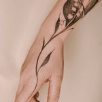 Fine-line floral arm, lily of the valley and vines