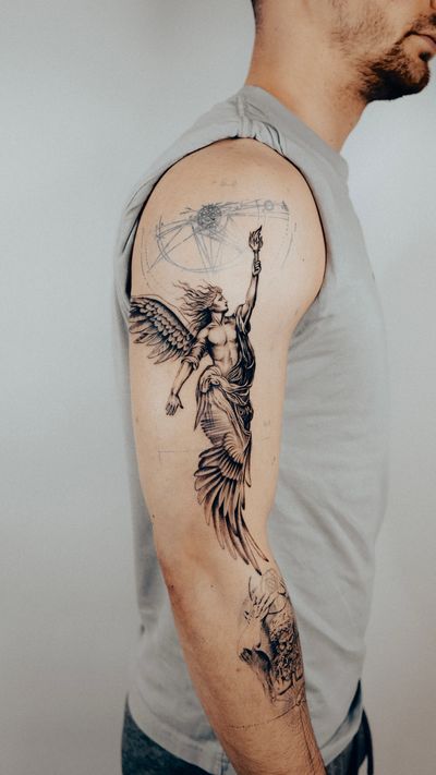 This black and gray, illustrative tattoo of an angel by Gabriele Edu symbolizes protection and guidance. Perfect for those seeking a guardian angel in their lives.