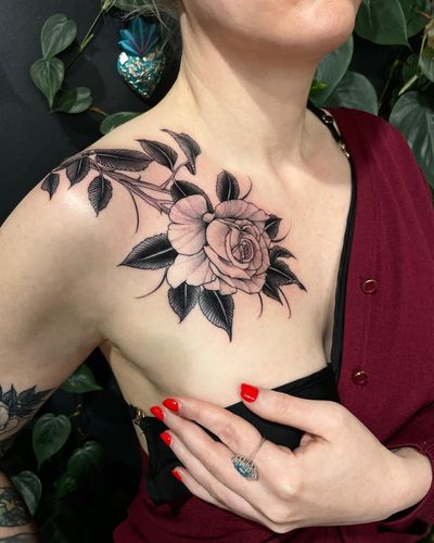 A stunning blackwork rose tattoo by Giada Knox, featuring intricate details and bold lines for a unique and timeless design.