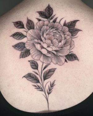 Experience the beauty of nature with this intricate floral tattoo by talented artist Giada Knox.