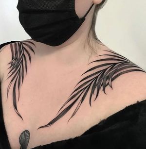 Transform your skin into a botanical masterpiece with this stunning blackwork tattoo by Giada Knox. Embrace the beauty of nature on your body.