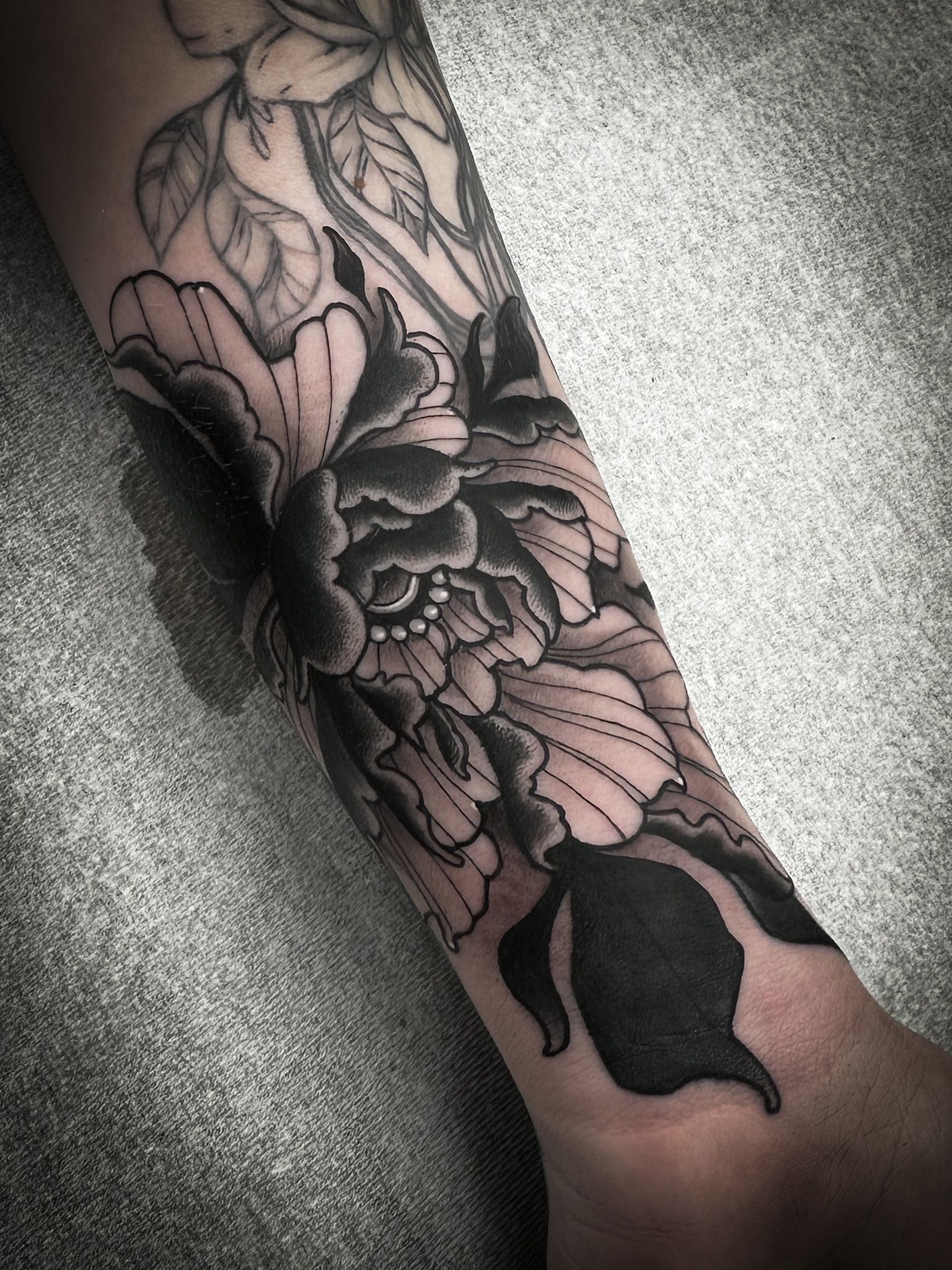 No Egrets Tattoo Studio - Peony for this elbow! Done by @mystikink • •  #noegretstattoo #noegrets #tattoo #elbowtattoo #peonytattoo #clarksvilletn  #tennesseetattoo #explorepage | Facebook