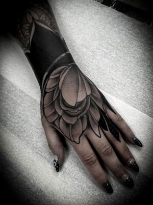 Ornamental Flower Hand Tattoo