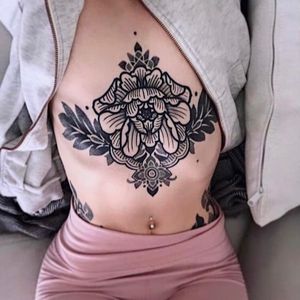 Elegant blackwork flower design by renowned artist Giada Knox, perfect for those who appreciate ornamental tattoos.