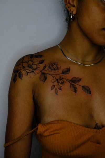 Shoulder and collarbone florals, done freehand 
