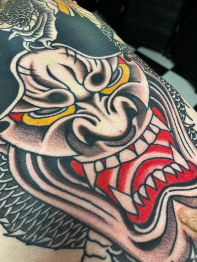 Experience the bold and powerful imagery of traditional Japanese hannya and oni in this striking tattoo design by the talented artist Liam Harbison.