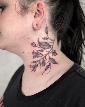 Experience the beauty of blackwork with this intricate flower design by tattoo artist Claudia Smith. Bold lines and shading make this piece truly unique.