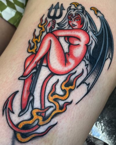 Traditional devil motif brought to life with bold lines and vibrant colors by skilled artist Liam Harbison.