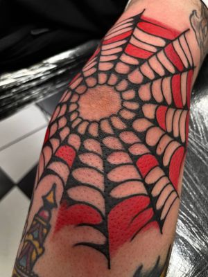 Get a classic traditional tattoo design featuring a web motif by the talented artist, Liam Harbison. Perfect for those who appreciate timeless ink art.