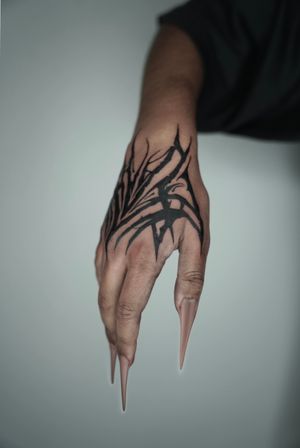 Experience the fusion of traditional blackwork with futuristic cyber sigils in this unique neo tribal tattoo by Dominga Longo.