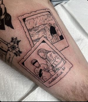 Get captivated by Miss Vampira's blackwork illustration of polaroid pictures in a cinematic tattoo design.
