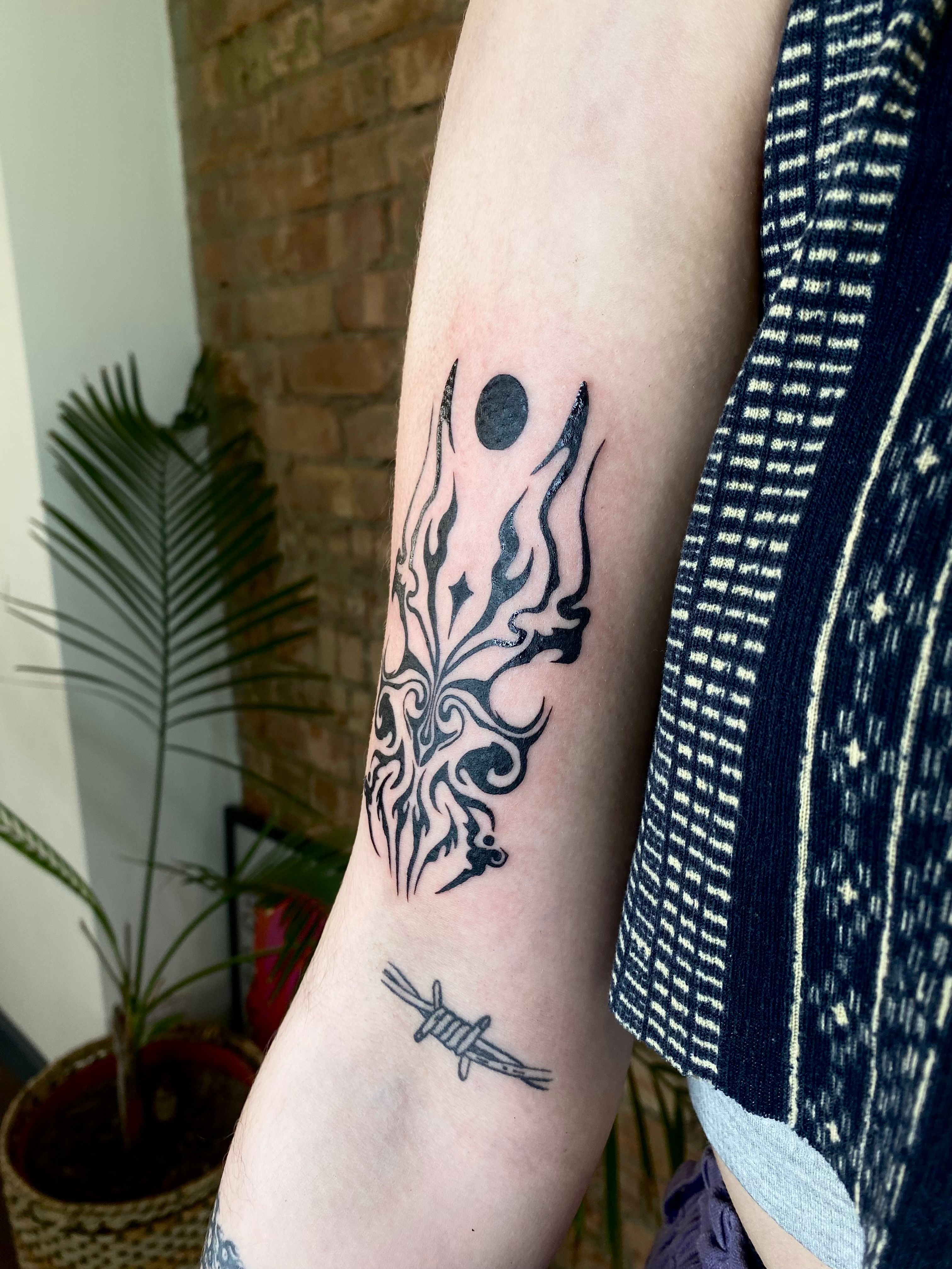 Elegant Symmetrical Tattoo Designs