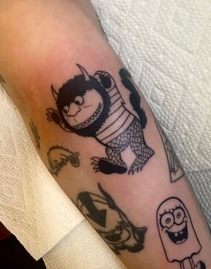 Explore the whimsical world of 'Where the Wild Things Are' with this illustrative tattoo by the talented artist Miss Vampira.