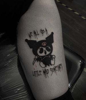 Get inked with this kawaii blackwork design by Sophia Hayes for a spooky yet adorable look.