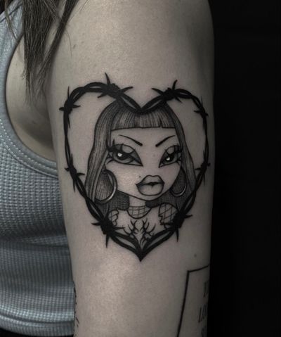 Get a unique blackwork tattoo featuring a doll, barbed wire and a heart design, created by the talented artist Sophia Hayes.