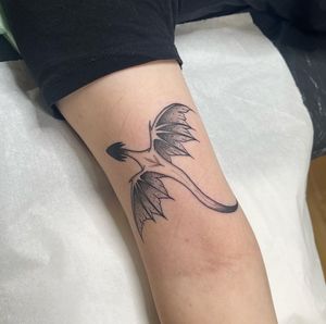 Get a stunning illustrative dragon tattoo designed by the talented artist Chris Harvey. Perfect for those wanting a unique and detailed piece.