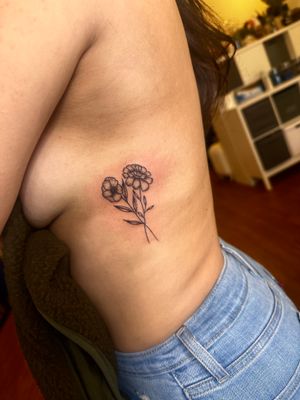 Get a stunning illustrative flower tattoo by the talented artist Miss Vampira. Perfect for adding a touch of beauty to your skin.