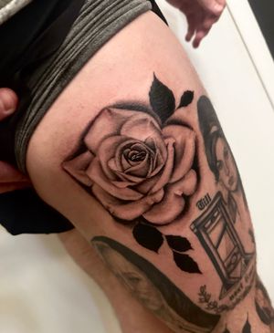 Get a stunning black & gray rose tattoo by Miss Vampira for a timeless and elegant look. Perfect for those who appreciate realistic artwork.