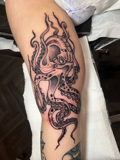 Get inked with a stunning illustrative octopus by Barney Coles, featuring detailed dotwork for a unique and visually striking design.