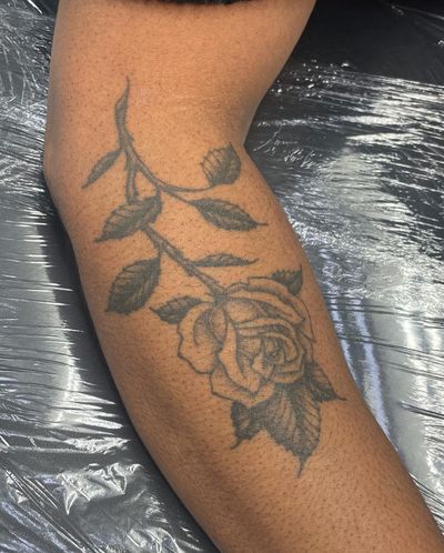 Experience timeless beauty with this traditional rose tattoo by renowned artist Julia Bertholdi. Perfect for those who appreciate classic artistry.