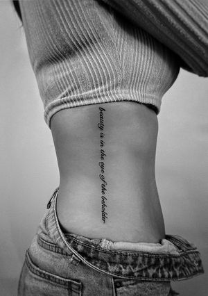 Beautiful and intricate small lettering tattoo by Kateryna Goshchanska, perfect for subtle and meaningful body art.