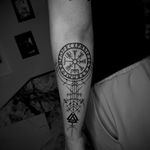 Experience the ancient magic of Norse runes in this illustrative tattoo by Kateryna Goshchanska.