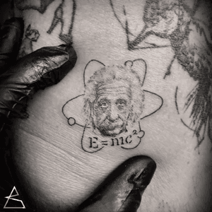 Albert Einstein. black and grey micro realism tattoo