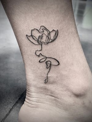 dancer flower morph. Black and grey illustrative tattoo