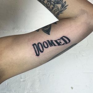 Bold lettering tattoo style