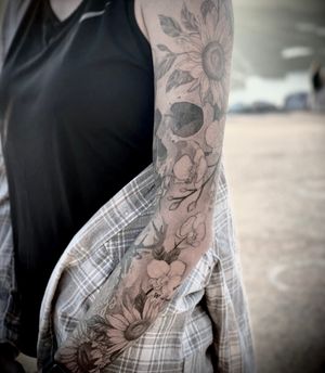 sunflowers and more. Black and grey illustrative tattoo
