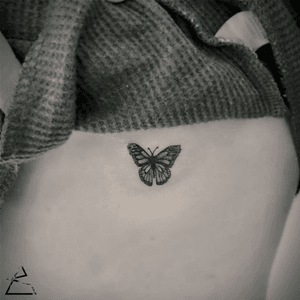 Butterfly. black and grey realism tattoo