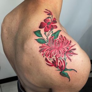 Get a vibrant and detailed illustrative flower tattoo by artist Karen Buckley. Stand out with this beautiful and colorful design!