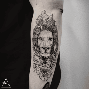 Lion. Black and grey illustrative tattoo