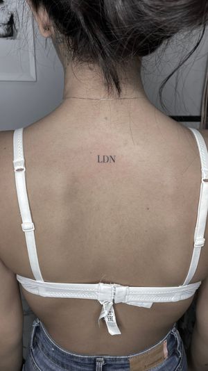 LDN tattoo, fine line tattoo, italic script . 