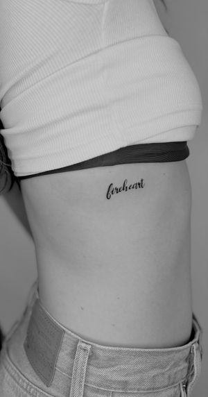 Express your unique style with this small lettering tattoo by talented artist Ruth Hall. Simple yet meaningful.