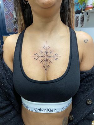 Get mesmerized by Eve inksane's intricate dot work  ornament pattern that will bring a unique and stylish touch to your body.