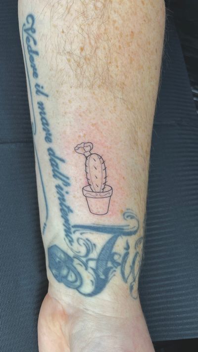 Cactus flower , fine line tattoo