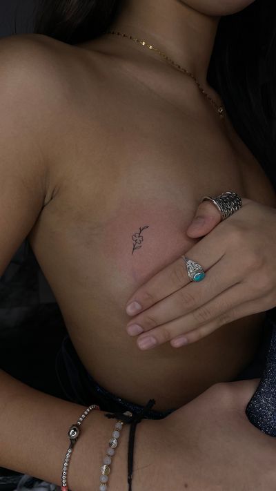 Leaf tattoo, around boobs . 