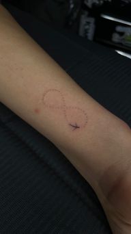 Infinite tattoo , travel tattoo , fine line tattoo