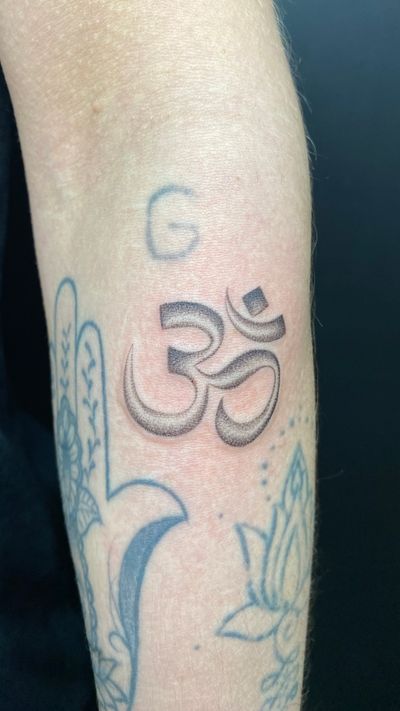 Om Devanagari symbol , dot work fine line tattoo