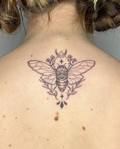 Exquisite illustrative design by Michelle Harrison, blending dotwork technique with intricate moth motif.