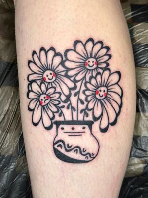 Get a bold and vibrant illustrative tattoo featuring a flower in a comic style vase, inked by Woozy Machine.