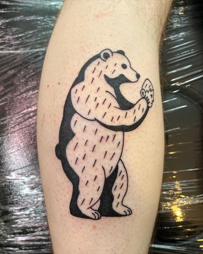 Experience the striking contrast of blackwork style with this illustrative tattoo featuring a bear, man, and mask design by talented artist Dave Norman.