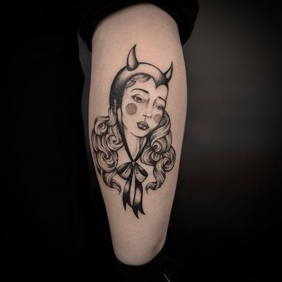 Get inked with this fierce and captivating devil girl tattoo design by talented artist Jenny Dubet. Dare to embrace your dark side with this unique and artistic piece.