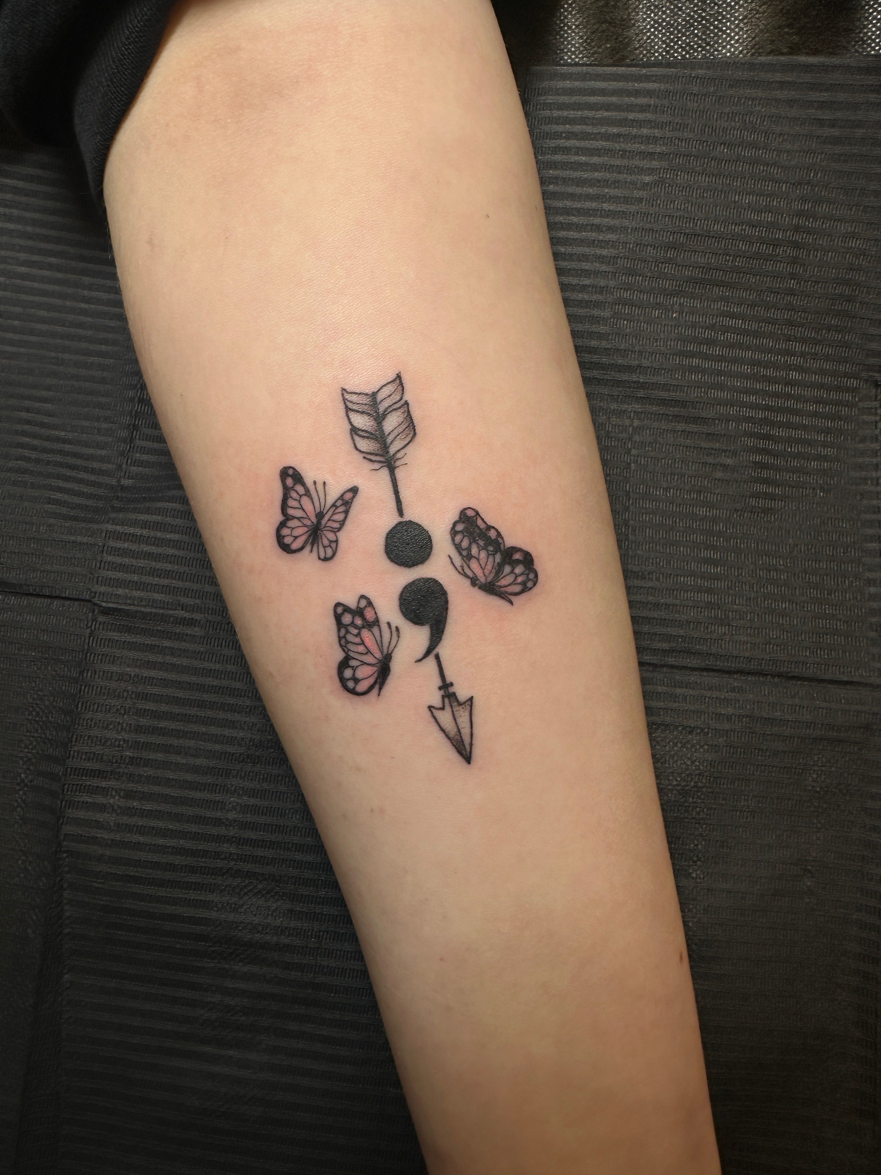 Small arrow temporary tattoo